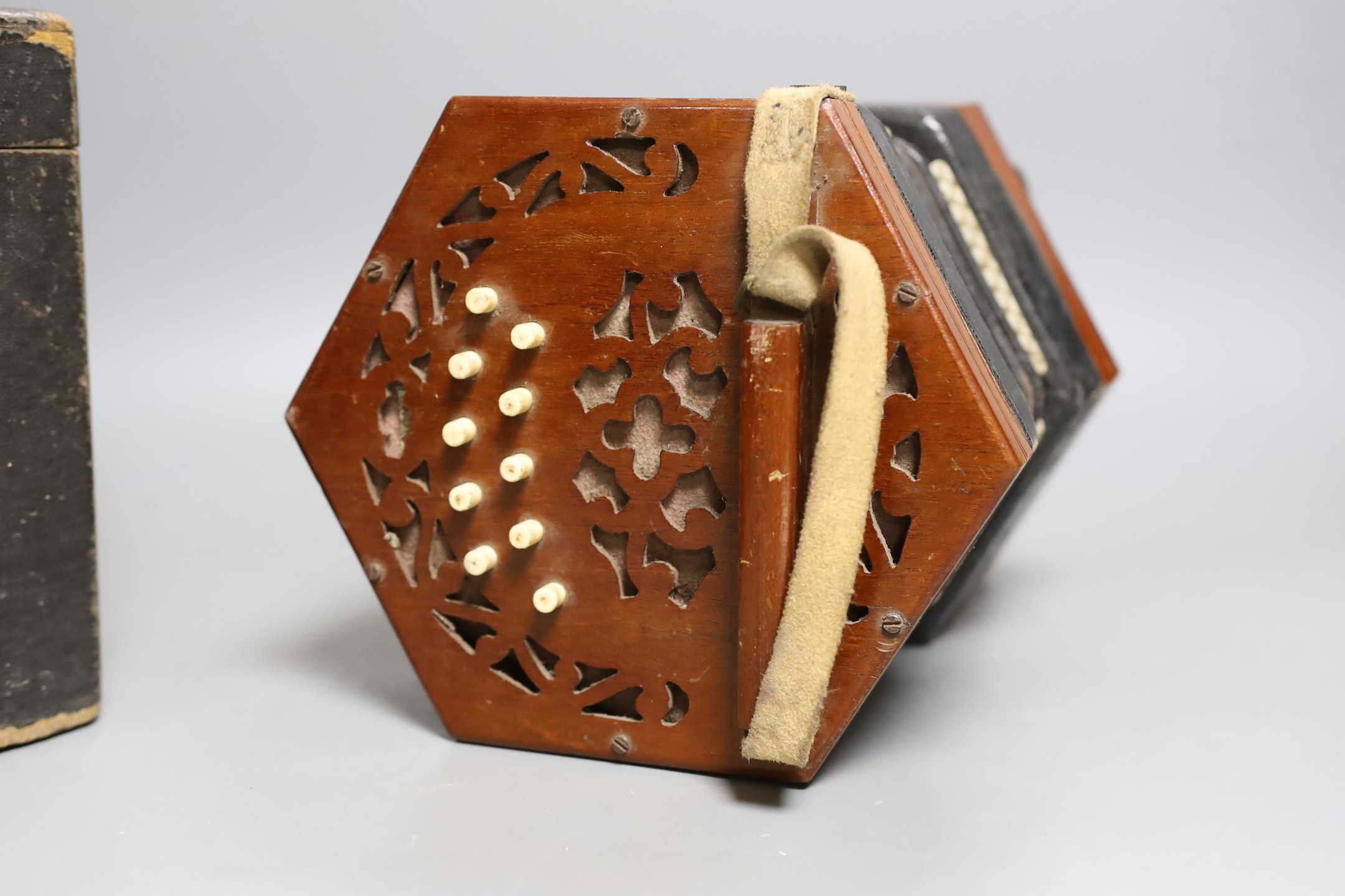 A cased Lachanel & co. 21 button concertina, 106301 - box is 18cm high